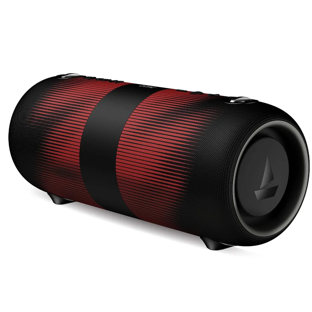 Portable Bluetooth speaker on a wooden table outdoors