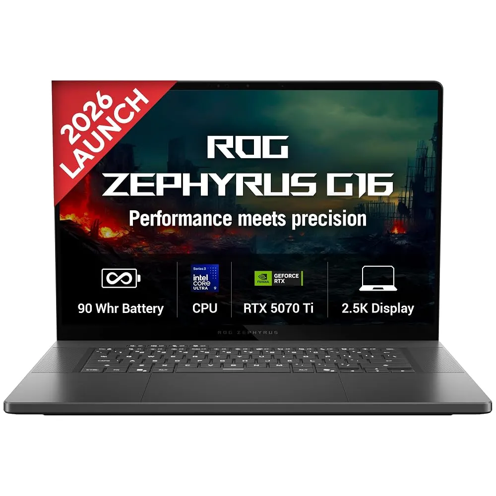 A sleek modern laptop displaying a video editing timeline on its bright OLED screen on a wooden desk.