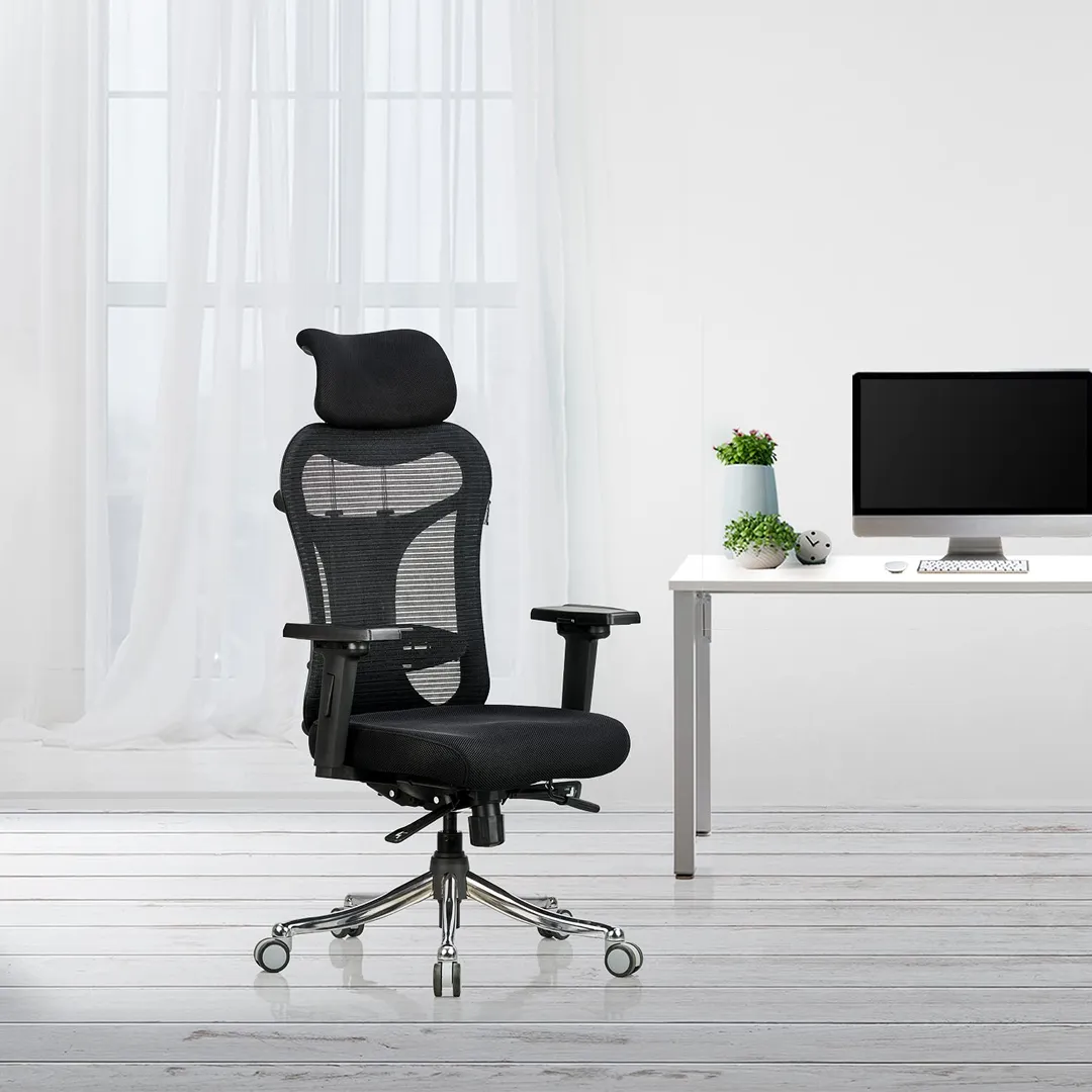 A modern ergonomic mesh office chair with adjustable armrests and lumbar support in a home office setting.