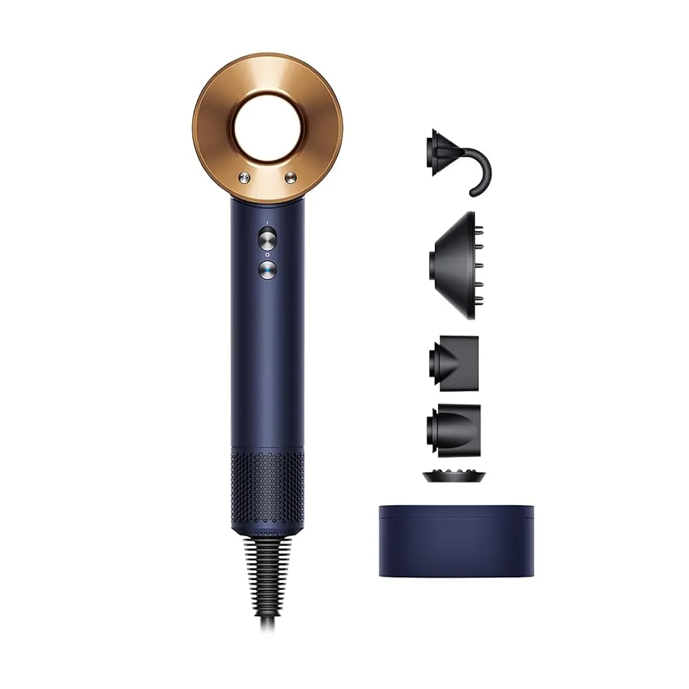 A sleek ionic hair dryer resting on a clean wooden countertop next to styling brushes.