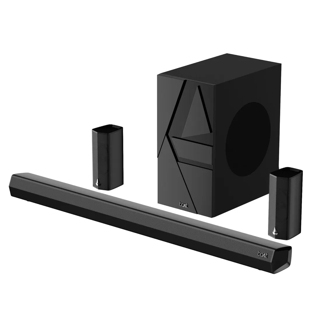 Soundbar sitting below a wall-mounted TV