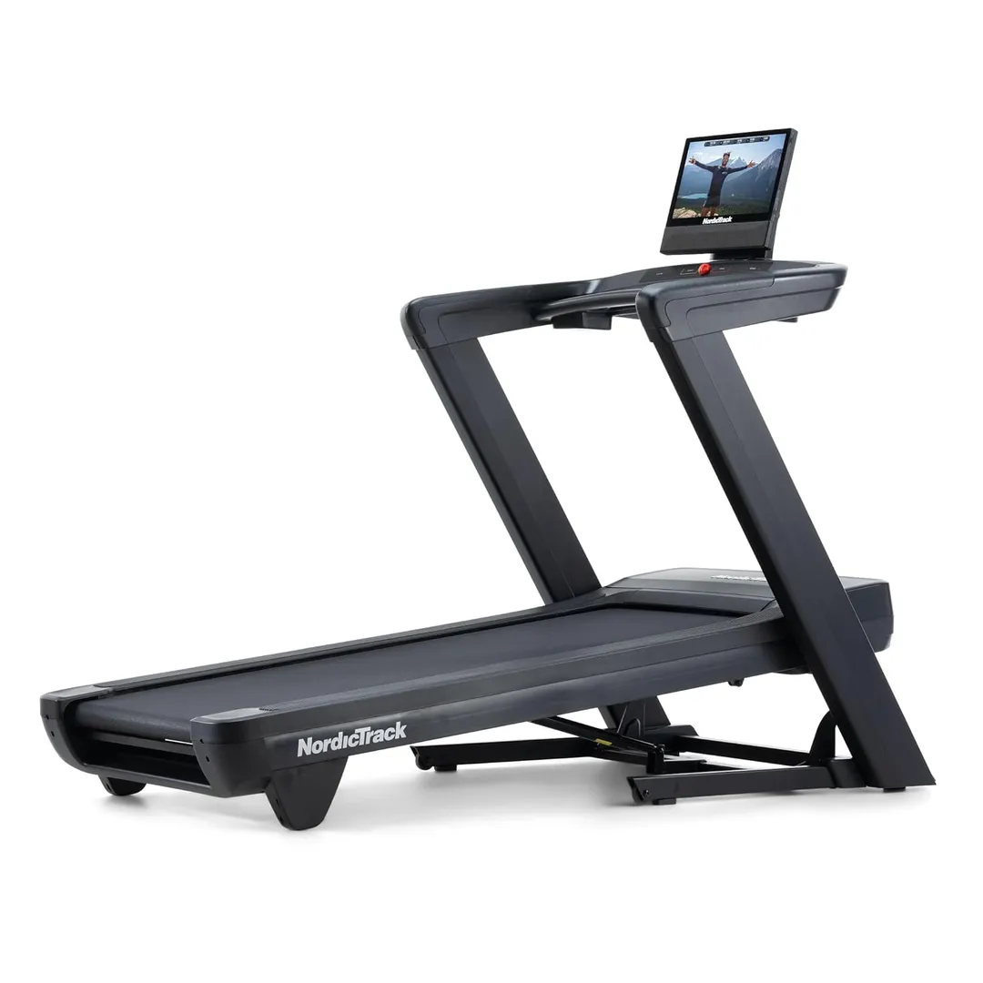 A person running on a high-quality treadmill in a modern home gym setting.